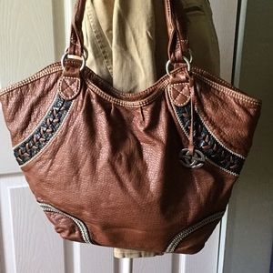 RED. Brown leather purse